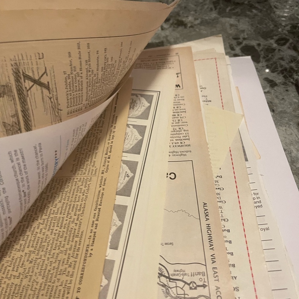 Ephemera. Random magazine and book pages, coffee stained pages.